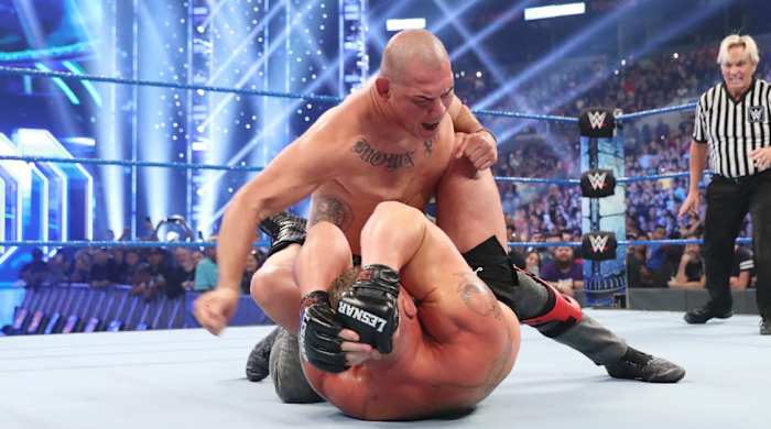 Brock Lesnar was attacked by Cain Velasquez following his win over Kofi Kingston. 